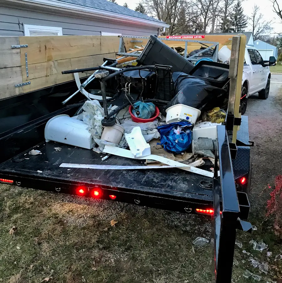 Roll-off dumpster delivered to a residential driveway in Vilonia