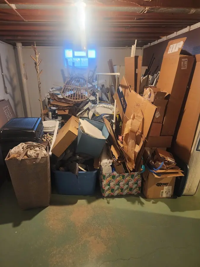 Roll-off dumpster container at job site for 15 Yard Dumpster Rental in Vilonia